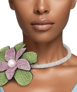 Pink and green flower choker necklace with an oversized rhinestone bloom and pearl center on a clear rhinestone tube collar