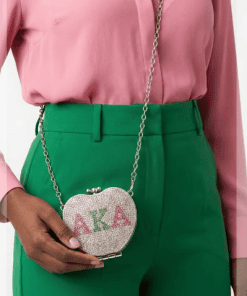 AKA rhinestone heart bag with pink and green AKA letters and striped bee clasp