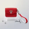 DST earbud case keychain in red pebbled faux leather with silver 1913 emblem
