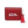 DST keychain wallet in dark red faux leather with white DST letters, tassel, and 1913 Fortitude charm