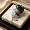 OES lady profile brooch with black rhinestone high puff, striped enamel headwrap, and dangling OES letters