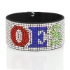 OES rhinestone bracelet with clear stones on black felt and red, blue, and green OES letters